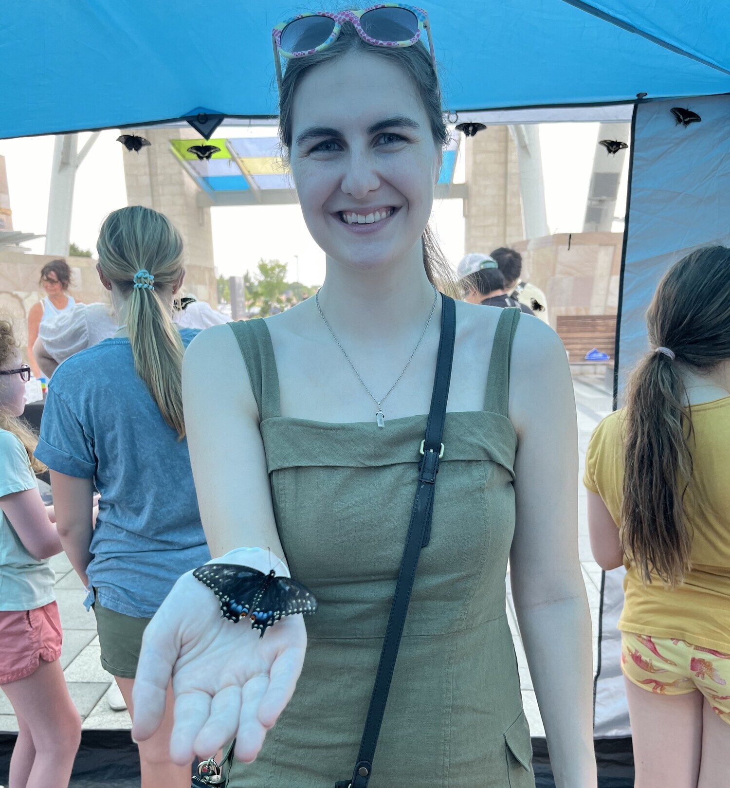 Rachel Albers holding a butterfly